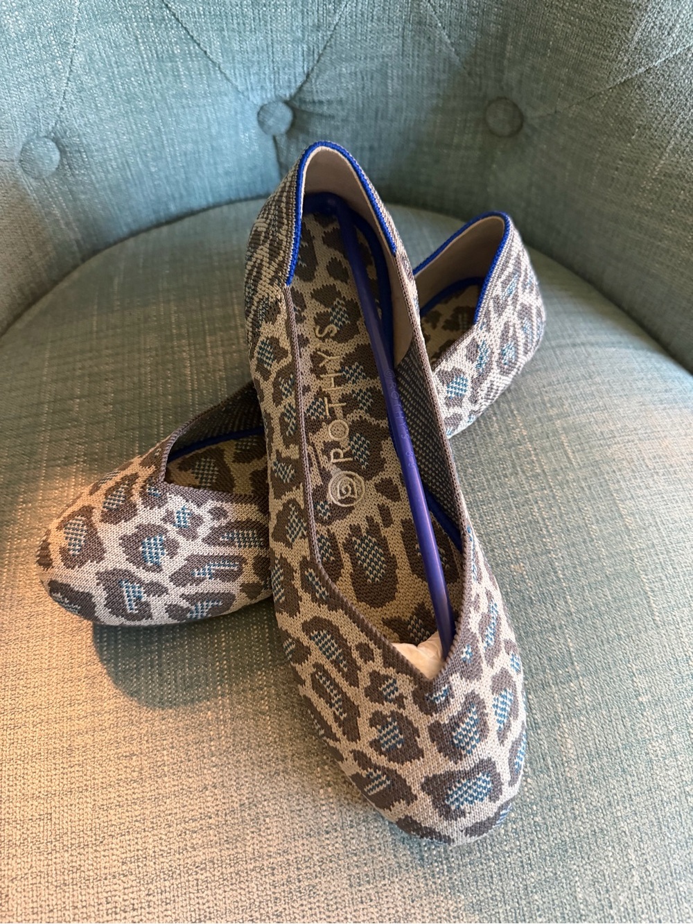 Rothy's Beige Leopard Flats with Blue Trim
